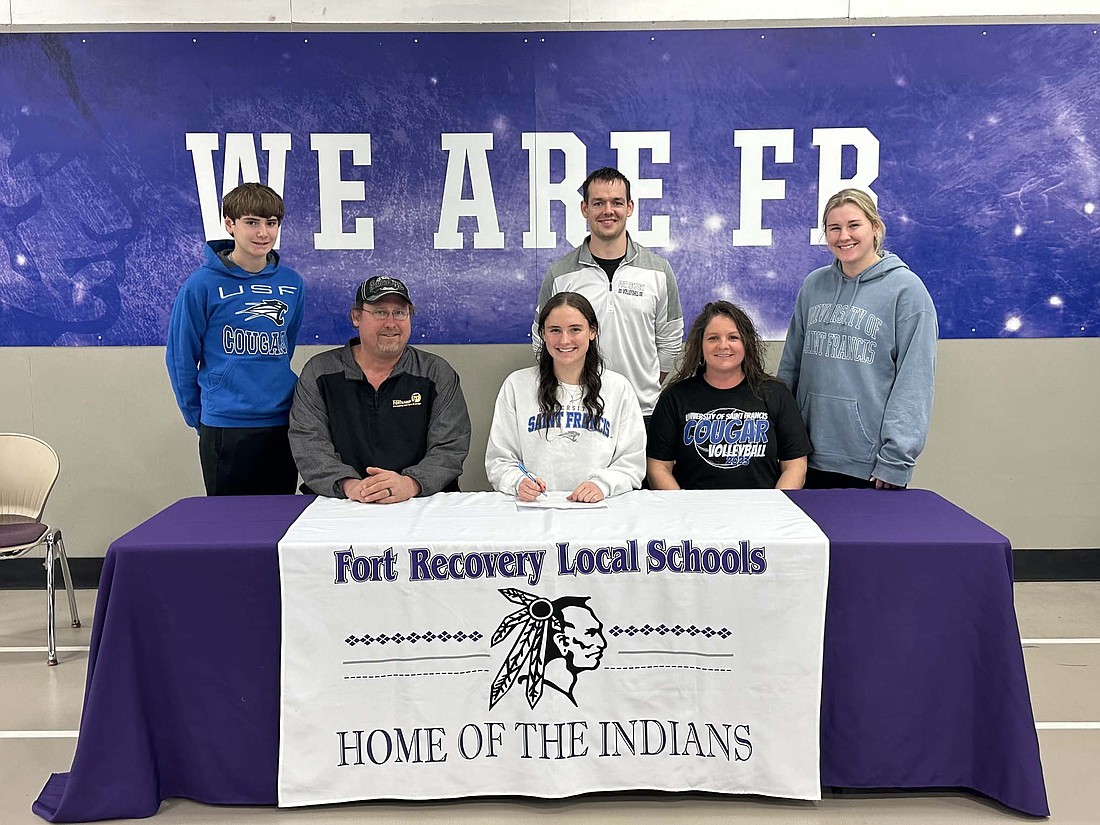 Pictured in the front row from left are father Brian Fortkamp, Teigen Fortkamp and mother Susie Fortkamp. (Photo provided)