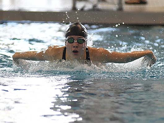 Joelle Kaup of Fort Recovery High School swims the butterfly during the Midwest Athletic Conference Invite hosted by Coldwater at Jay County High School on Saturday. Kaup finished second behind Ava Shardo of Versailles by four seconds. (The Commercial Review/Ray Cooney)