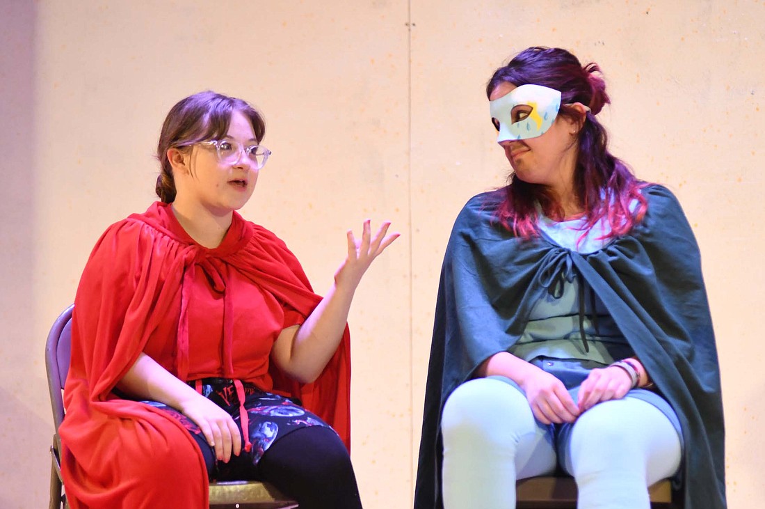 Natalee Hough (left) gestures while portraying Speed Freak as she talks to Jovana Markovic as Kevin during Tuesday’s rehearsal for the Jay County Junior-Senior High School production of the comedy “Super Freaks.” Performances are scheduled for 7 p.m. Friday, 2 and 7 p.m. Saturday and 2 p.m. Sunday. Admission will be $5. (The Commercial Review/Ray Cooney)