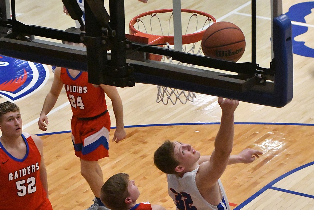 JCHS senior Wesley Bihn puts up a reverse layup in Jay County’s 53-39 win over Southern Wells Thursday night. (The Commercial Review/Andrew Balko)