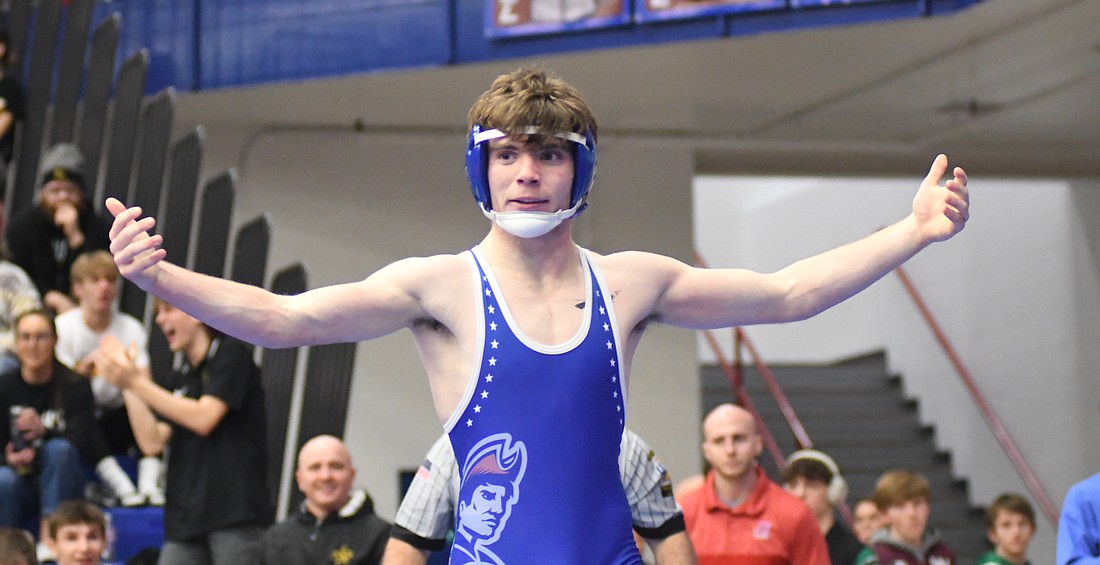 It was a weekend of mixed emotions for Jay County High School athletes.
	Pictured above, Cody Rowles raises his arms in victory after upsetting fifth-ranked and undefeated Neil Mosier of Delta during their 126-pound regional semifinal match Saturday in the tournament at JCHS. Rowles went on to win the regional championship and is one of seven Patriots who qualified for the semi-state tournament. (The Commercial Review/Ray Cooney)
	Below, Jay County senior Sophie Saxman gets a hug from her dad Bill after the Patriot girls basketball team came up just short, losing 37-36 to Class 3A No. 1 Hamilton Heights in the sectional tournament at Yorktown. The Patriots have gone 45-5 over the last two seasons, with four of those losses coming to the Huskies. (The Commercial Review/Andrew Balko)