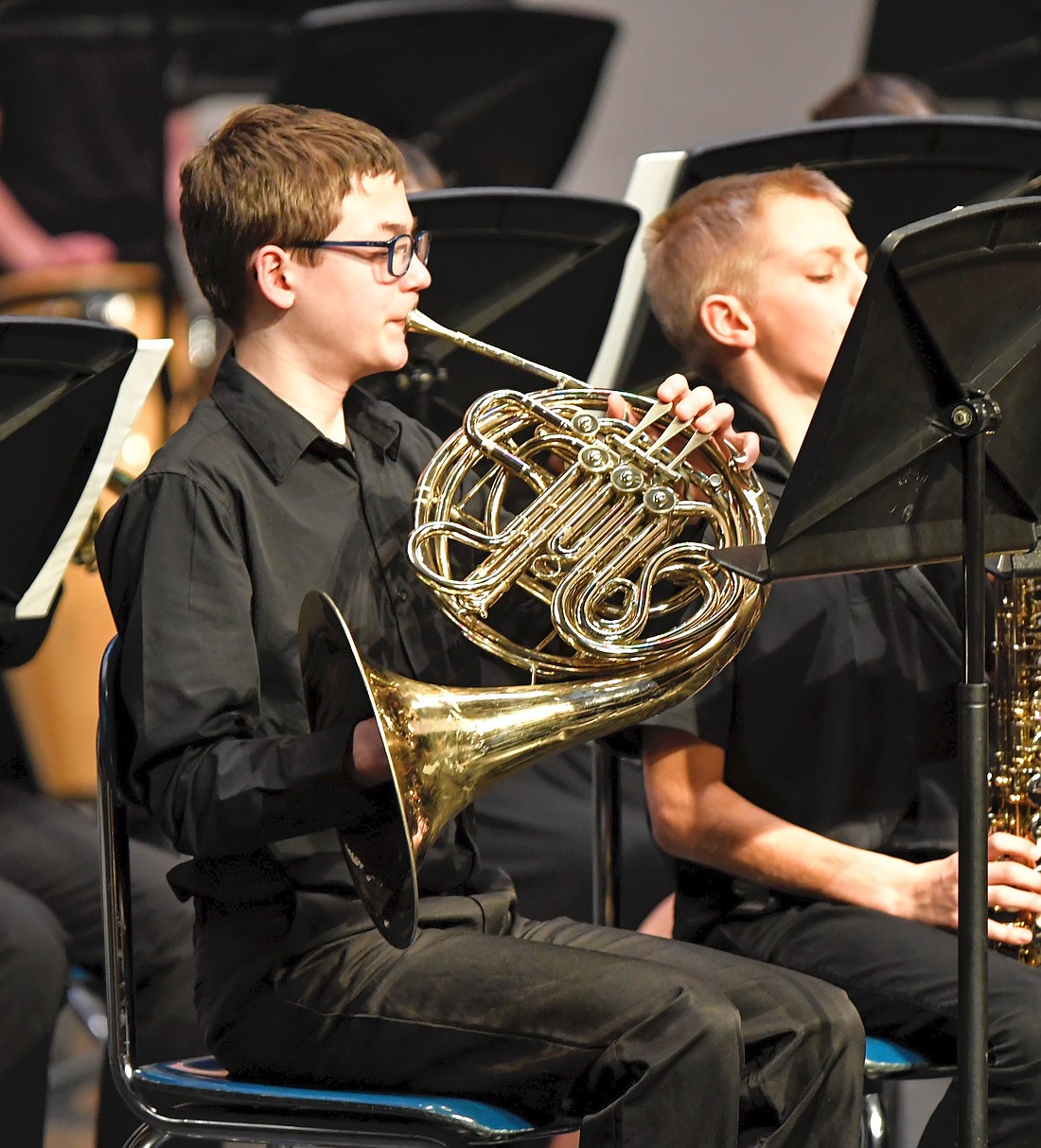 Seventh grader Gavin Heitkamp plays the French horn on Sunday during the Fort Recovery Local Schools band concert. (Special to The Commercial Review/Kim Wendel)