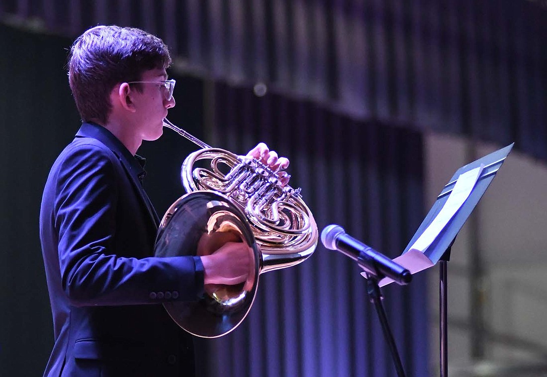 Jay County High School freshman Caleb Garringer performs “Romance” by Alexander Scriabin during Sunday’s Winter Pops Concert. (The Commercial Review/Ray Cooney)