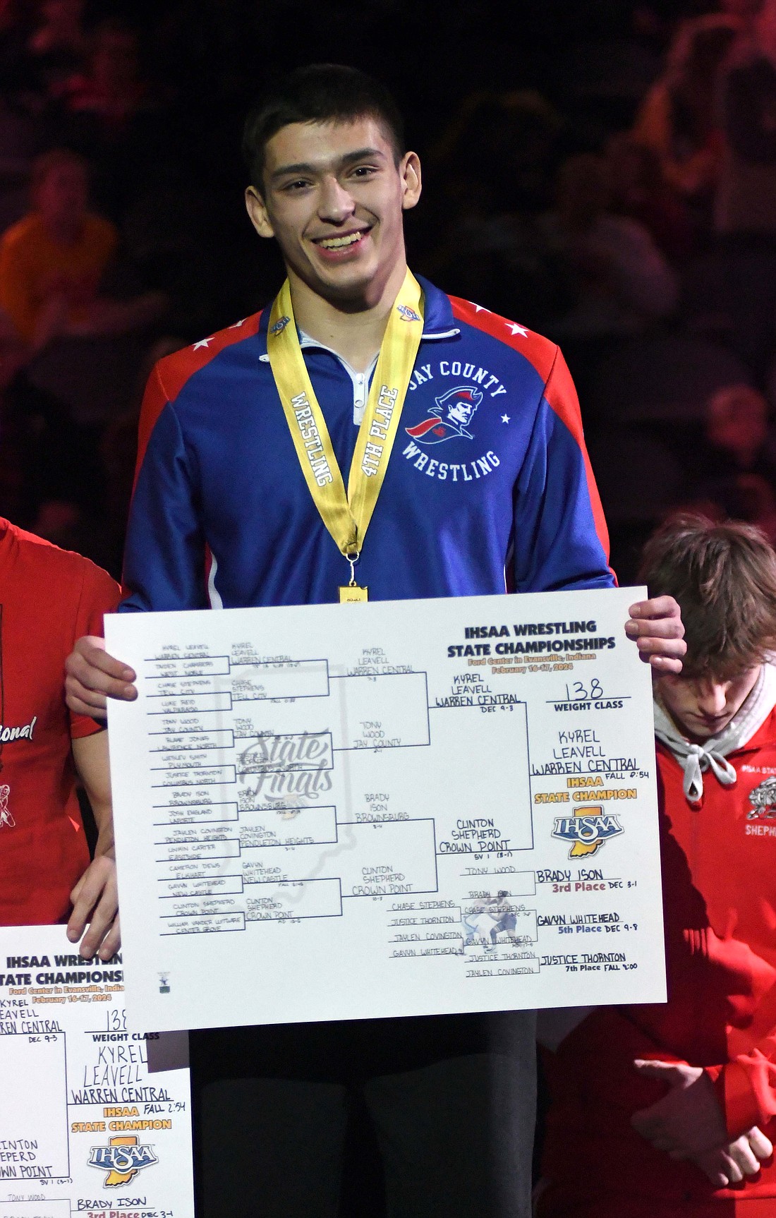 Jay County High School seniors Tony Wood (above) and Cody Rowles (below) both made the podium this weekend during the IHSAA Wrestling State Finals at the Ford Center in Evansville. Wood finished in fourth place at 138 pounds, the highest Patriot placing in a decade, and Rowles was eighth at 126 pounds. For more on the state finals, see page 10. (The Commercial Review/Ray Cooney)