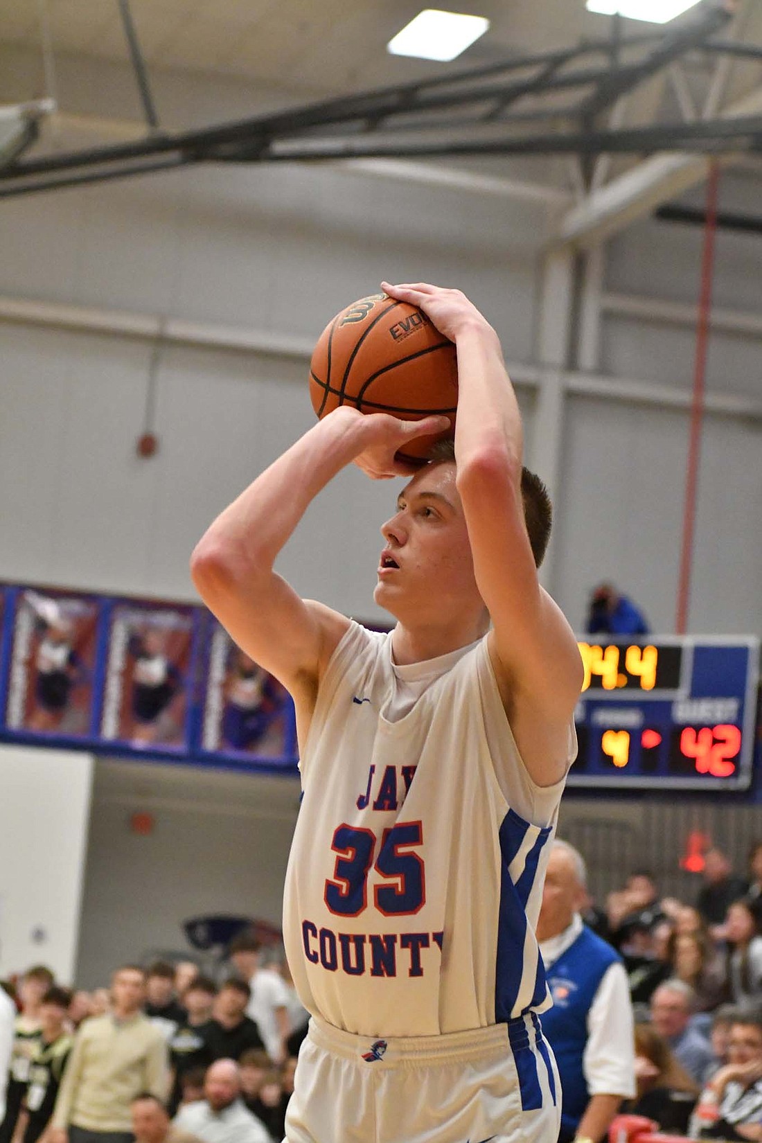 Jay County High School sophomore Gradin Swoveland fires up a three in the final minute of the Patriots’ 47-45 win over Winchester on Tuesday. Swoveland hit the shot to take the lead before Winchester answered it. The JCHS sophomore finished with 16 points. (The Commercial Review/Andrew Balko)