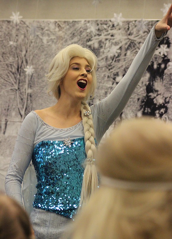 Elsa sings Thursday at Jay County Public Library during the "Frozen" sing-along party. (The Commercial Review/Bailey Cline)