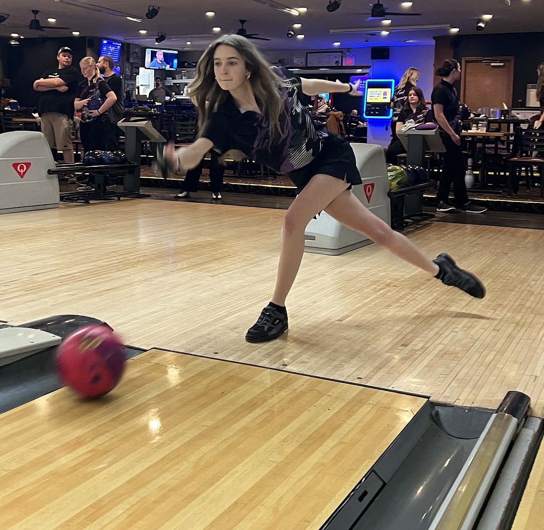 Fort Recovery High School senior Brooklyn Wyerick releases her bowling ball during practice Tuesday at Miracle Lanes in Fort Recovery. Wyerick, along with Kayla Heitkamp, Emily Lauber, Ella Schoen and Deanna Brown will make the trip to Columbus to compete in the first state tournament as a team in club history. (Special to The Commercial Review/Alison Rosegrant)