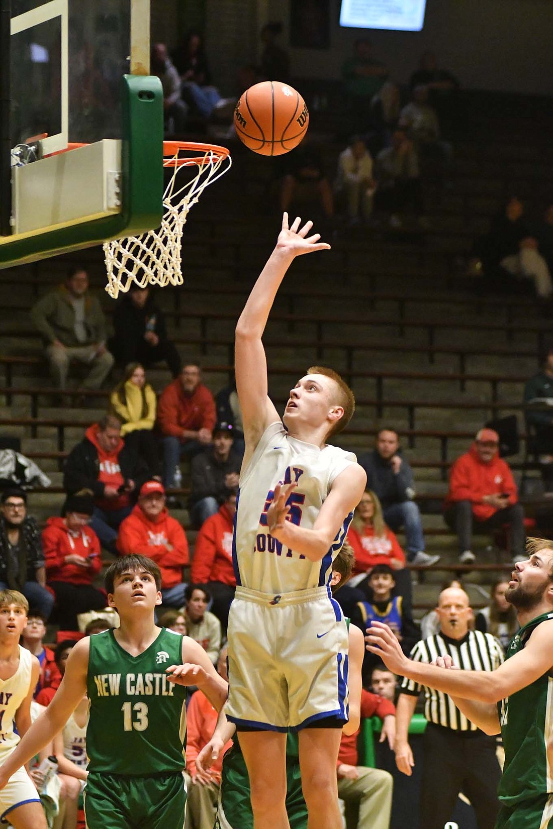 JCHS sophomore Gradin Swoveland floats up an easy layup after receiving a dime from Liam Garringer Wednesday in the sectional opener at New Castle. Swoveland finished as Jay County's second-leading scorer in the 46-38 loss. (The Commercial Review/Andrew Balko)