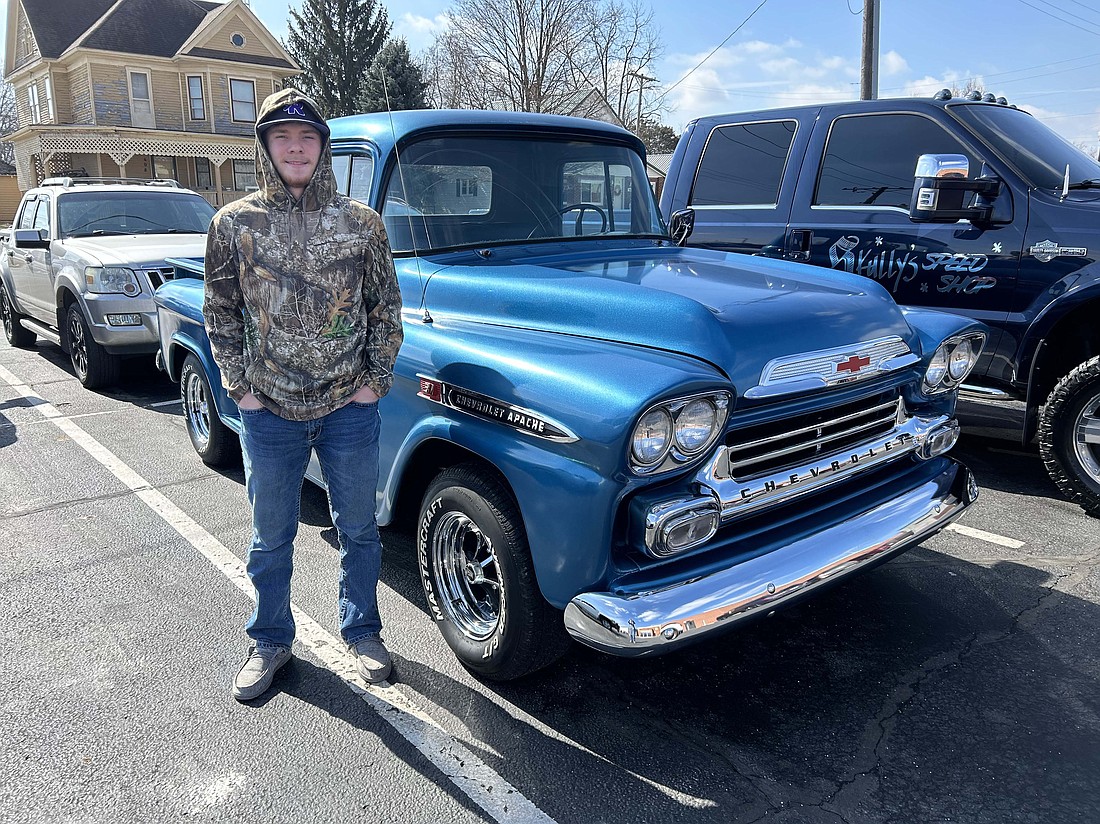 Fort Recovery FFA awarded two sophomores for winning its truck and tractor drives during National FFA Week. Pictured abovve is FFA member Reece Wendel with his oldest 1959 Chevy truck, and below is FFA member Russell Pohlman with his best restored Farmall M tractor. (Photos provided)