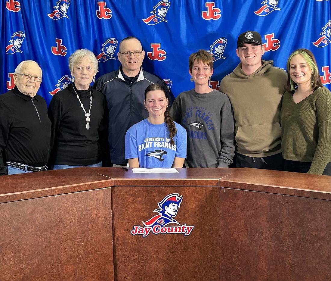 Jay County High School senior Brenna Haines is pictured with family after signing her national letter of intent to play volleyball at Saint Francis University in Fort Wayne on Tuesday. (Photo provided)