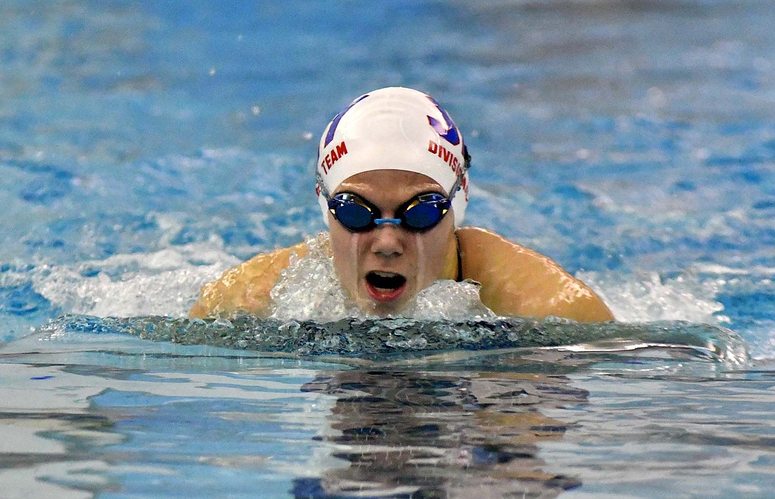 Brooklynn Byrum swims the breaststroke leg of the 200-yard medley relay for the Jay County Junior High School swim team on Friday during the Allen County Athletic Conference meet, hosted by the Patriots. Along with contributing to the girls’ ACAC championship, the relay team broke the meet record with a time of 2 minutes, 9.84 seconds. (The Commercial Review/Andrew Balko)