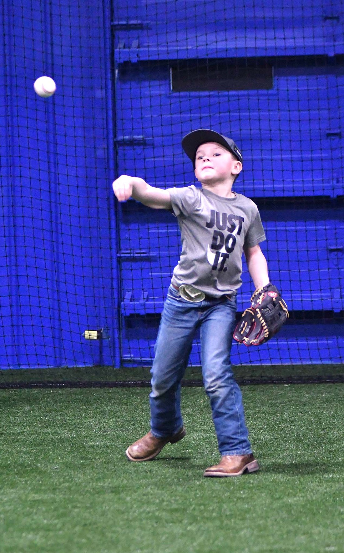 Kaysen Farr plays catch at the Jay County Baseball Club’s new facility The Clubhouse on Friday. Phase one is nearing an end and the facility is preparing to open within the next couple of months. For more on the facility, see Thursday’s edition of The Commercial Review. (The Commercial Review/Andrew Balko)