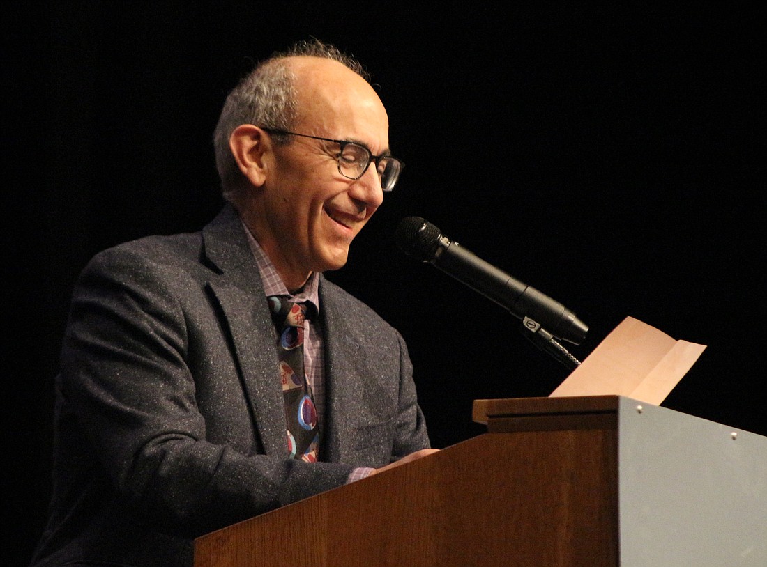 Speaker Ed Hosbach grins while cracking a joke at the Fort Recovery Chamber of Commerce awards banquet Sunday. Hosbach, a 2023 Hall of Fame inductee, introduced honorees throughout the event. (The Commercial Review/Bailey Cline)