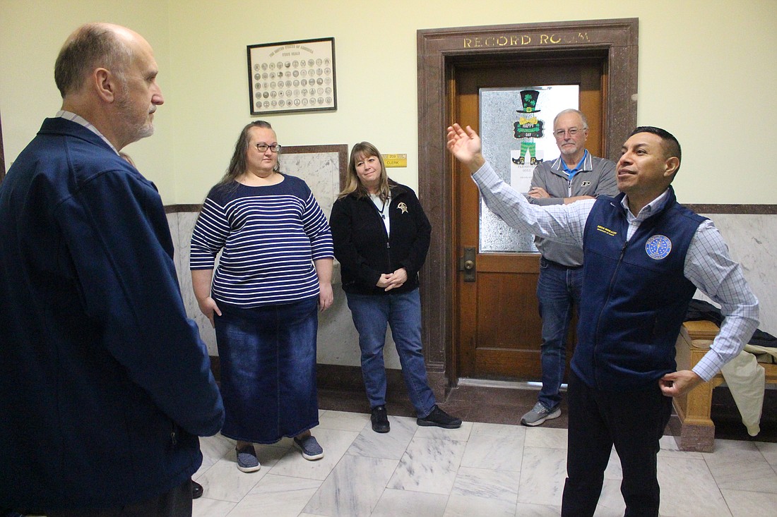 Indiana Secretary of State Diego Morales (pictured speaking at right) visited Jay County Clerk’s Office on Tuesday to present a $20,000 grant for election improvements. Morales talked about the November election, noting the potential for a bigger voter turnout. “We need to be ready and my job is to give you county clerks … the tools and resources you need,” he said. (The Commercial Review/Bailey Cline)