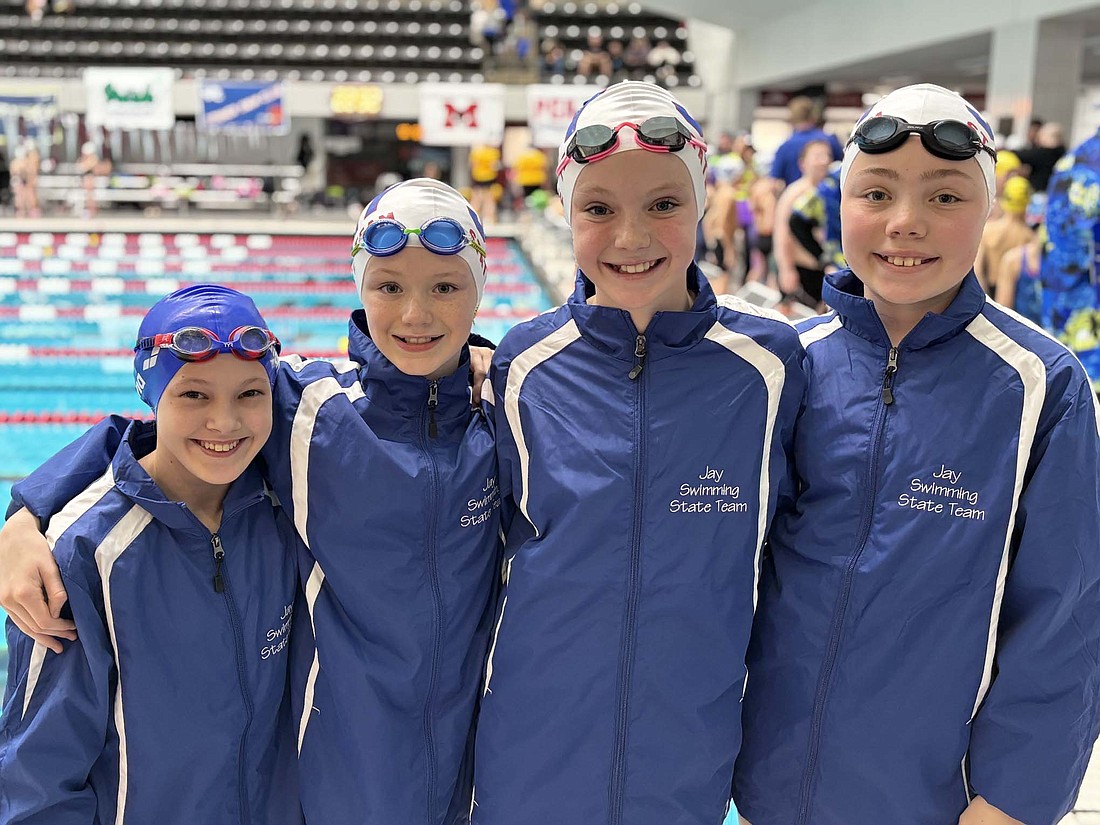 The Jay County Winter Swim Team had five tankers compete at the state meet at IUPUI over the weekend. Pictured from left to right are Sophie Warvel, Carsyn Guggenbiller, Addisyn Champ and Ellie Wendel. The four combined to compete in two relay events, while Warvel, Guggenbiller and Champ all swam in individual events as well. Cooper Glentzer was the only boy to make state for Jay County. (Photo provided)