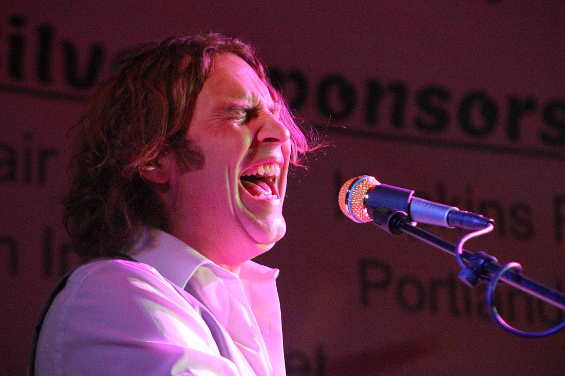 Jay County Cancer Society held its Dueling Pianos benefit show Saturday at Jay County Fairgrounds. Pictured above is Dan Louisell, a Michigan native and player with Dueling Pianos International. All proceeds from the event in Portland went toward Jay County cancer patients. (The Commercial Review/Bailey Cline)