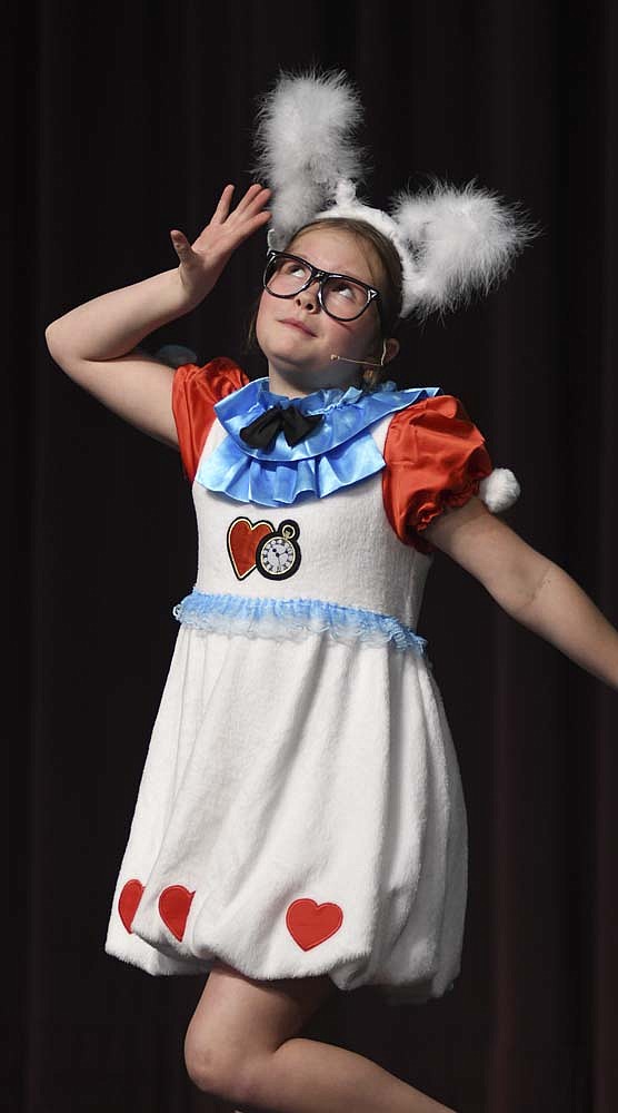 Helena Roessner performs as the White Rabbit during rehearsal Tuesday for the Fort Recovery Elementary/Middle School production of “Dorothy in Wonderland” the musical. Performances are scheduled for 7 p.m. Friday and 2 p.m. Saturday and Sunday. Tickets, which will be available at the door, are $8 for adults and $6 for students, with children younger than 5 admitted free. (The Commercial Review/Ray Cooney)