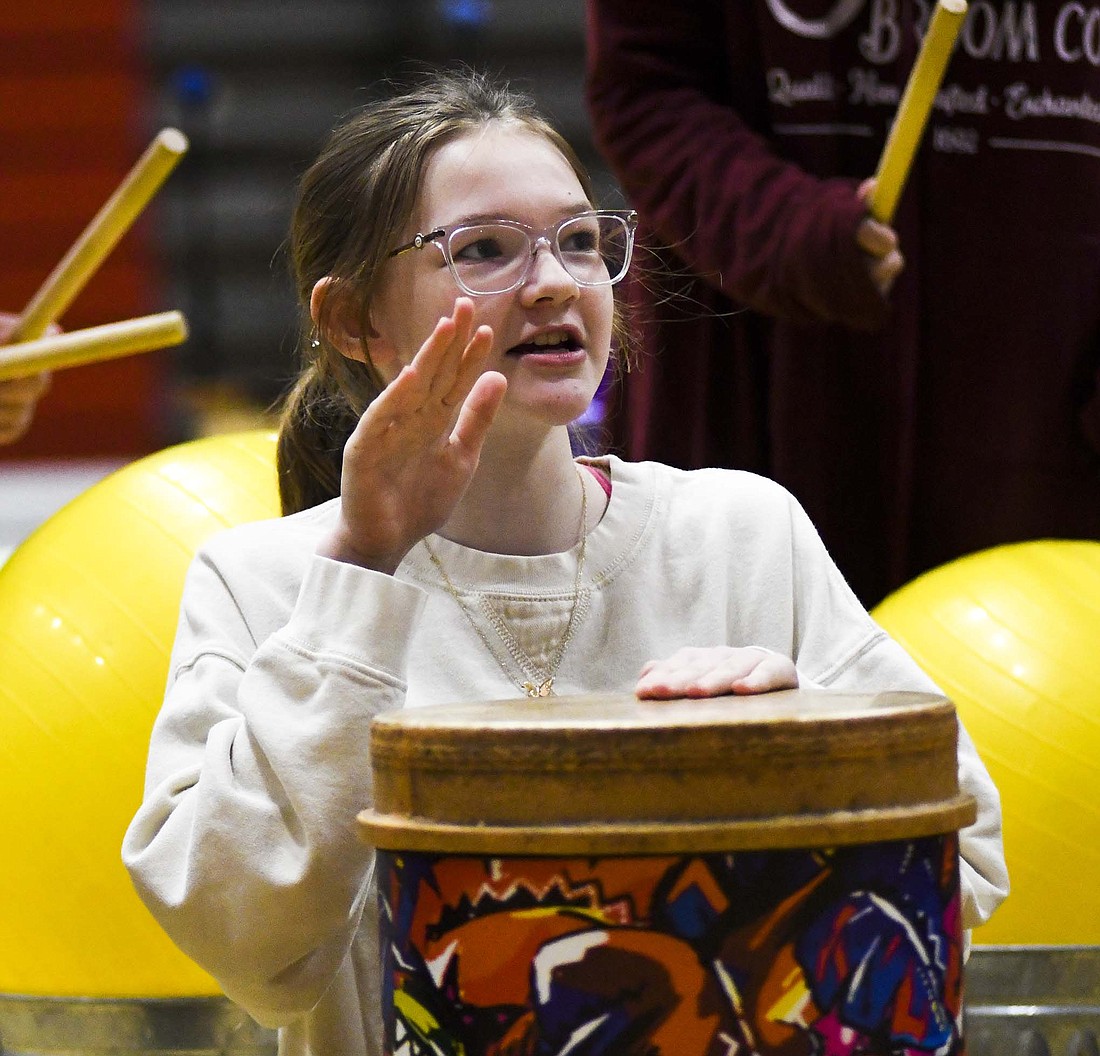 Bloomfield Elementary School sixth grader Chloe Lewellen plays a drum during Tuesday morning’s rehearsal for the school’s spring program later that evening at East Jay Elementary School. The performance included dancing, singing and percussion numbers. (The Commercial Review/Ray Cooney)