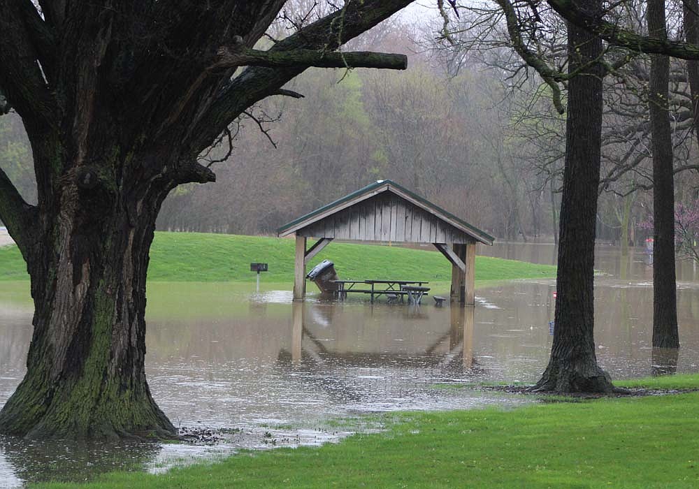Rain beginning Wednesday evening and continuing through today had the shelter house just south of the Salamonie River and the low-lying part of the Hudson Family Park walking trail under water around noon today. Jay County is under a flood warning through Friday evening. (The Commercial Review/Bailey Cline)