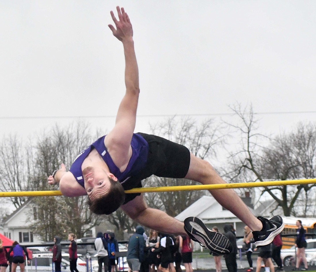 Fort Recovery High School senior Lucas Acheson takes his final attempt of the high jump during the home track meet on Thursday. Acheson finished second with a jump of 5 feet, 8 inches, to help the Indians to a first-place finish with 86 points to beat out Memorial, New Bremen, New Knoxville and Parkway. (The Commercial Review/Andrew Balko)