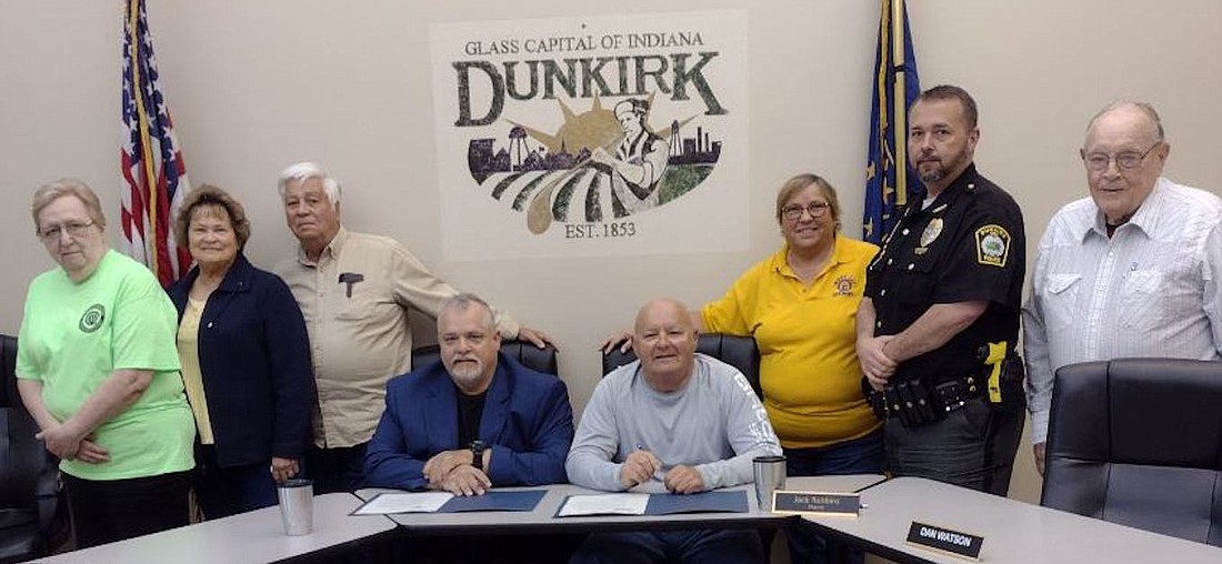 Mayors Jack Robbins (Dunkirk) and Jeff Westlake (Portland) signed proclamations declaring April 29 through May 4 as Respect for Law Week. Pictured from left are Optimist club members Kathy Jones, Linda Aker and Mike Aker, Westlake, Robbins, Optimist Sandy Rogers, Dunkirk Police Chief Dane Mumbower and Optimist Leland LeMaster. (Photo provided)