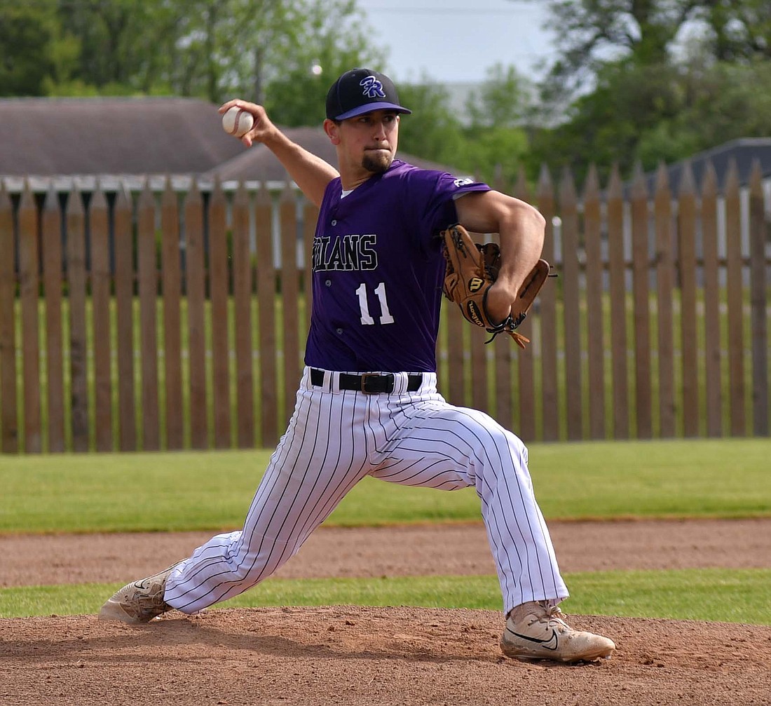 Troy Homan, a senior at Fort Recovery High School, hurls a pitch during a resumed game from April 9, against the Versailles Tigers on Wednesday. Versailles took down the Indians 6-1 to clinch a share of the Midwest Athletic Conference baseball title with the Minster Wildcats. (The Commercial Review/Andrew Balko)