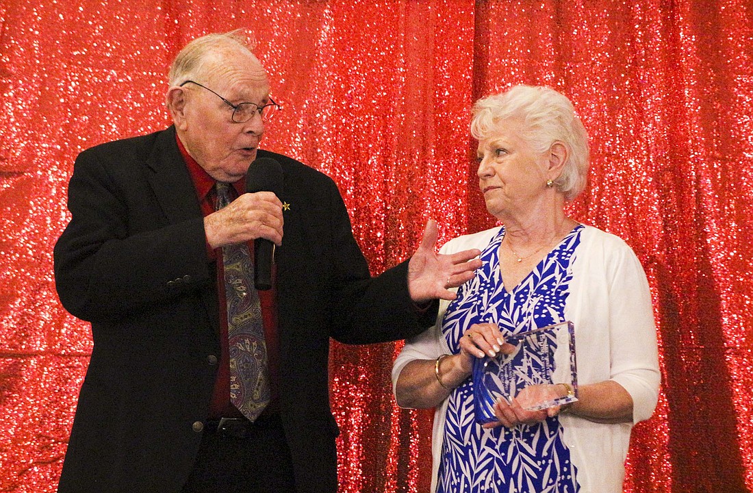 Leland and Judy LeMaster thank the community after receiving The Spirit of Vicki Lifetime Achievement award Saturday at the Jay County Community Awards at Spoke & Wheel Event Center in Portland. The LeMasters were honored for their years of volunteering, helping with Optimist clubs as well as launching the Mighty Marvel Optimist Club for residents with mental disabilities. (The Commercial Review/Bailey Cline)