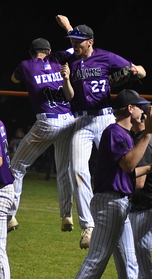 FRHS seniors Sage Wendel (14) and Gavin Faller (27) celebrate following the Indians’ 12-8 comeback win over Parkway on May 22. The Indians are playing in the regional tournament for the first time since 2016, when they made it to the state semifinal. (The Commercial Review/Andrew Balko)