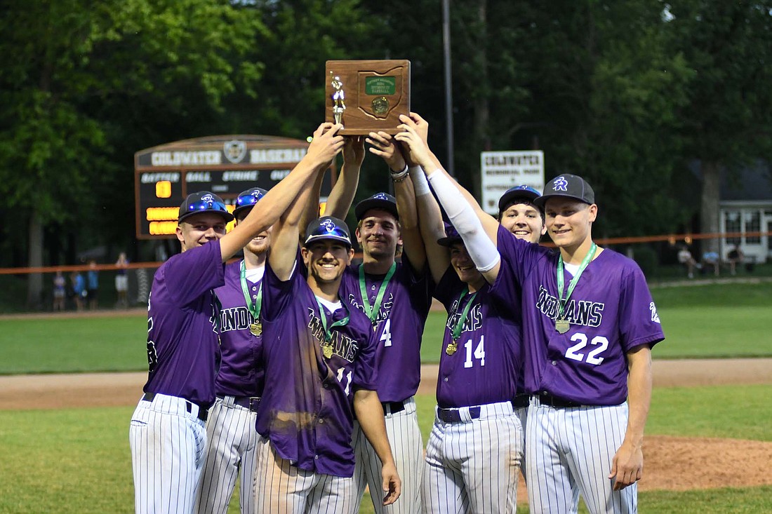 The seniors from the Fort Recovery High School baseball team hold up the district championship trophy after beating fourth-seeded Marion Local 11-3 on May 24. The Indians are set to face the Montpelier Locomotives today in the OHSAA Division IV regional opener hosted by Elida for the chance to play in tomorrow’s regional championship. (The Commercial Review/Ray Cooney)