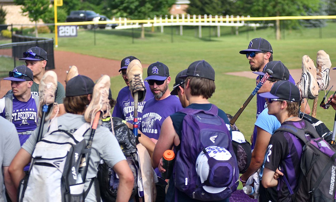 Fort Recovery baseball coach Kevin Eyink addresses his team after practice on Tuesday as the Indians prepare to compete in the OHSAA Division IV state tournament this weekend. The Indians will take on Hillsdale at 4 p.m. on Saturday at Canal Park in Akron, Ohio, for a chance to play in Sunday’s final. (The Commercial Review/Andrew Balko)