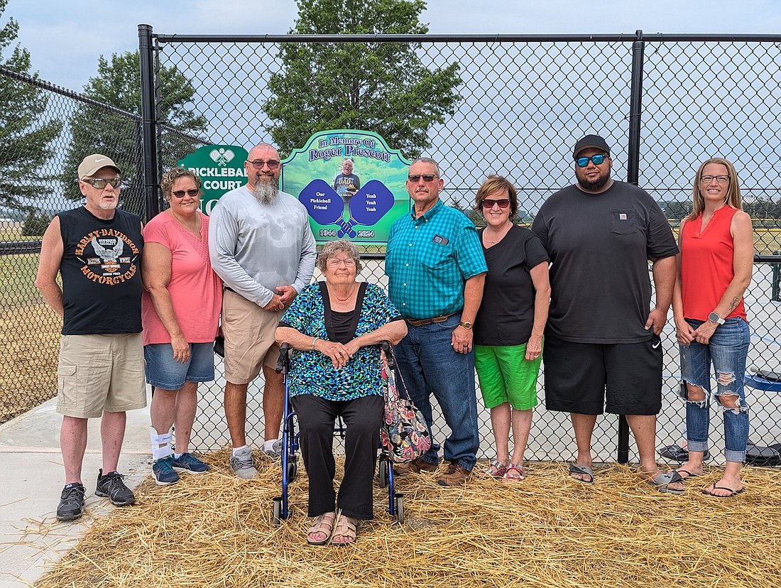 The pickleball courts at Milton Miller Park were dedicated recently in honor of Roger Prescott, who died May 9. Pictured, from left, are Gene Steveson, Rogina Prescott, Bob Prescott, Linda Prescott, Steve and Jane Prescott, Skyler Prescott with Jennifer Weitzel of Portland Park Board. (Photo provided)