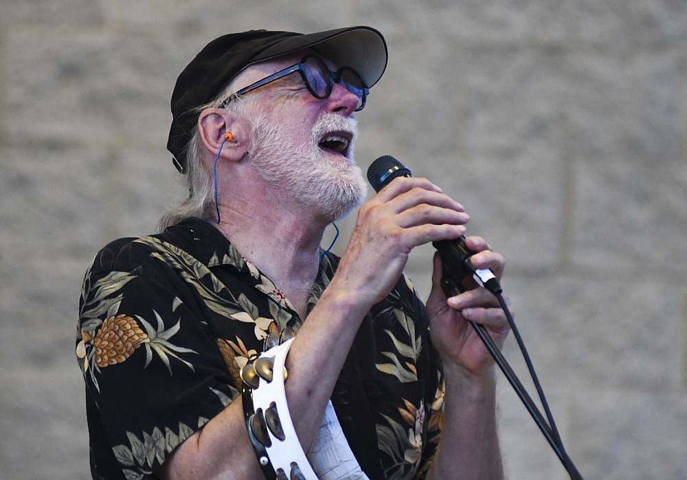 Arts Place kicked off its 2024 Hudson Family Park Amphitheater Concert Series with a crowd of more than 700 in attendance to see Phil Dirt & the Dozers. Pictured, Steve Cabot sings following the concert’s intermission. Cabot is a founding member of the band, which has been performing for more than 40 years. The next concert in the series will feature Whoa, Man! Band at 8 p.m. July 18. (The Commercial Review/Ray Cooney)