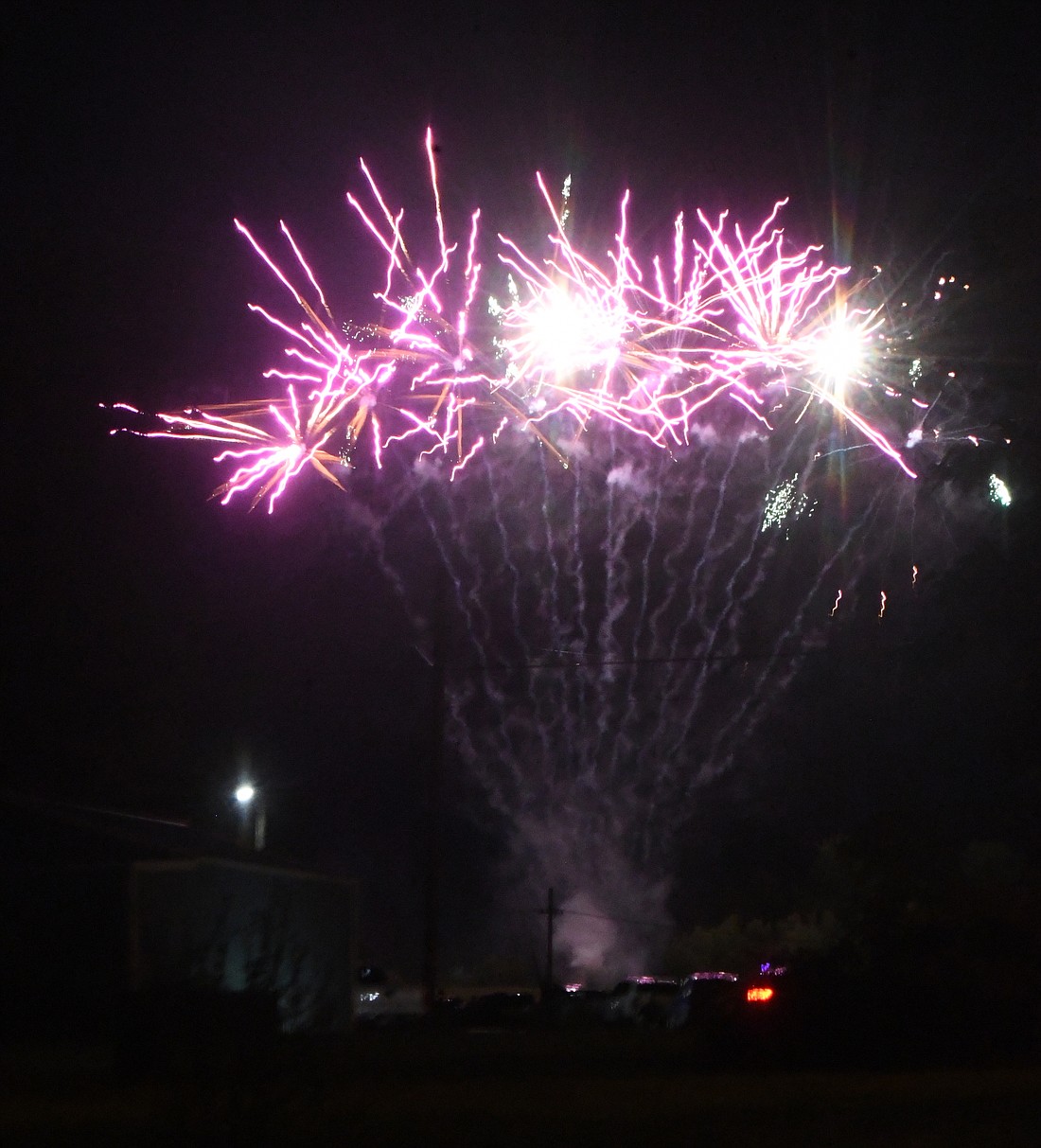 Fireworks light up the sky over Dunkirk City Park on Saturday night in this view looking north from the intersection of Washington and Center streets. Independence Day activities continue with the 4th of July parade at 11 a.m. Thursday in Portland followed by a celebration at Jay County Fairgrounds concluding with fireworks at dusk. Redkey’s fireworks are scheduled for Saturday. (The Commercial Review/Ray Cooney)