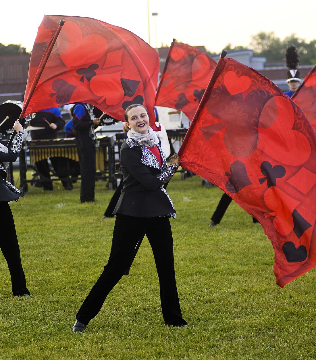 Cherith Butler of the Jay County High School Marching Patriots color guard performs Saturday during the Archway Classic. JCHS placed third in its season opener. The Marching Patriots will host the Jay County Lions band contested at 7 p.m. Friday at Jay County Fairgrounds. They are scheduled to take the track at 8:05 p.m. (The Commercial Review/Ray Cooney)
