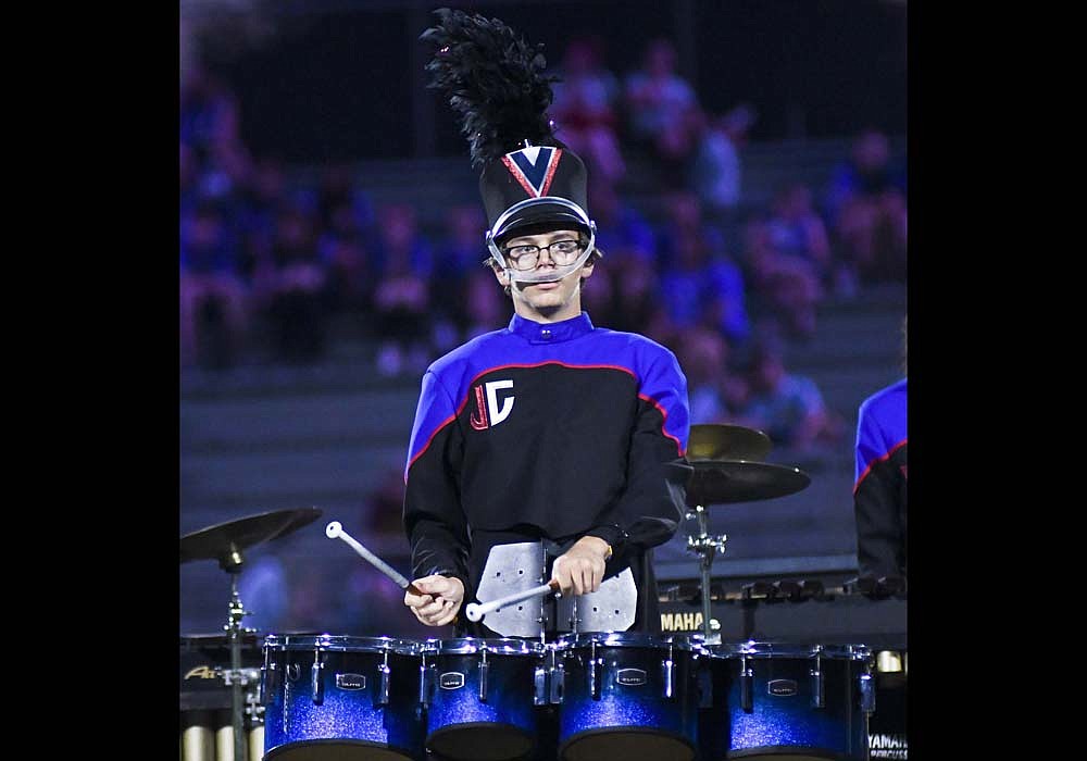 Following band camp this week at Indiana Wesleyan University, the Jay County High School Marching Patriots will compete Saturday night in the Drums at Winchester. Pictured, Jase Walter plays the quads during last weekend’s Spirit of Sound contest at Muncie Central. The Drums at Winchester, which will begin at 7 p.m. Saturday, is the final contest before the Indiana State Fair and will feature 23 bands. The Marching Patriots are scheduled to take the field at 9:53 p.m. Show times for other top bands based on results so far this summer include Centerville at 7:09 p.m., Richmond at 8:12 p.m., Anderson at 8:39 p.m. and Kokomo at 9:44 p.m. (Muncie Central, which finished first at both its home contest and the Jay County Lions Band Contest, will not be in competition Saturday.) (The Commercial Review/Ray Cooney)