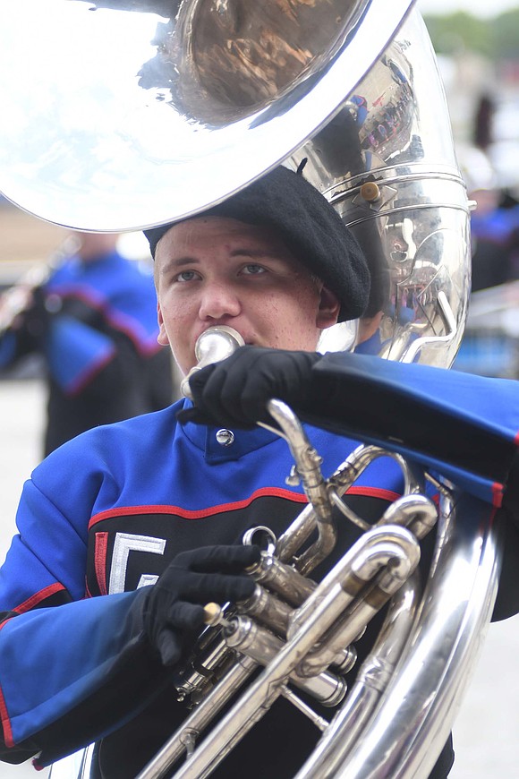 Sousaphone player Ben Shrack performs during the “Skyfall” portion of Jay County’s James Bond-themed show. (The Commercial Review/Ray Cooney)