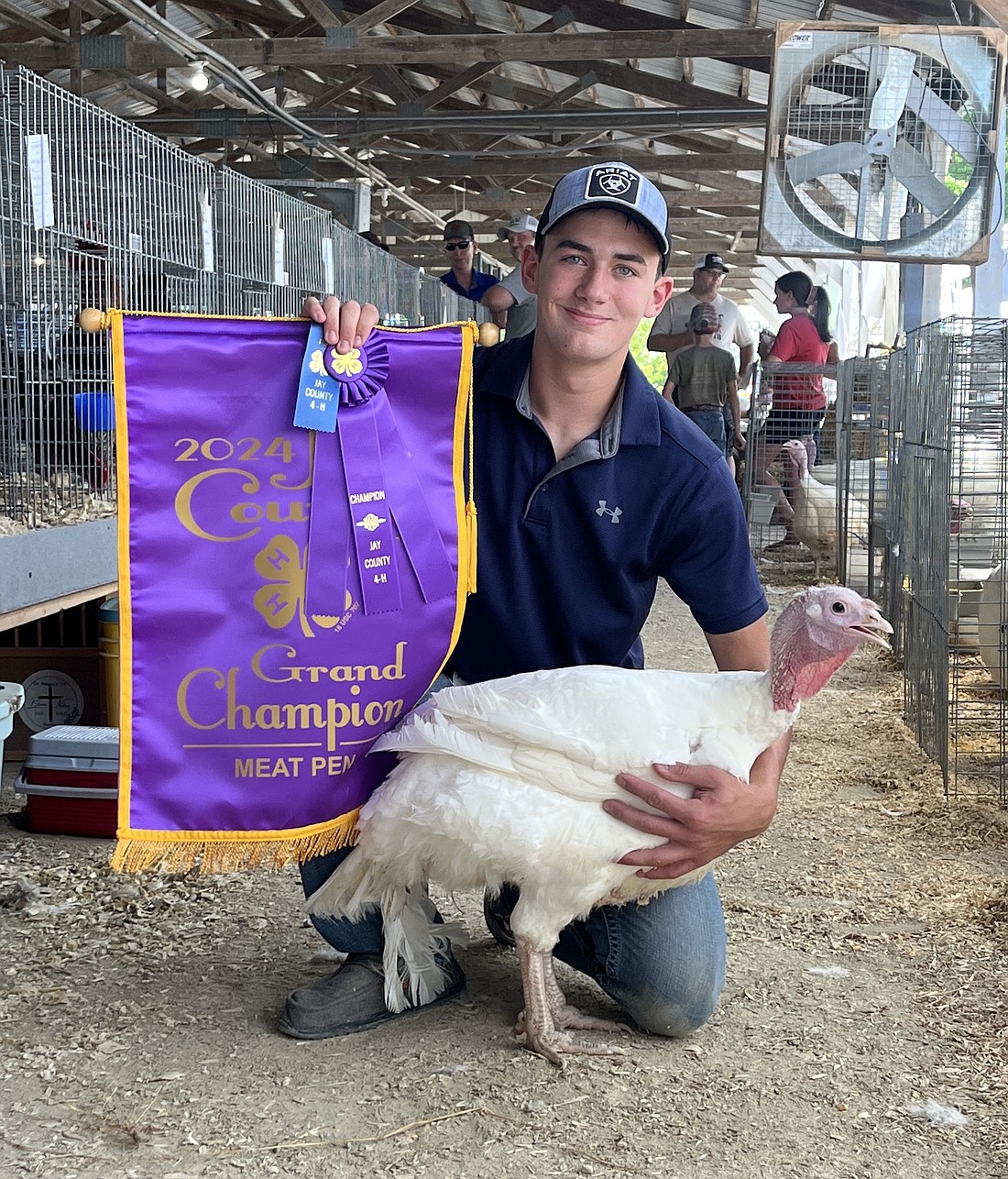 During the Jay County 4-H poultry show last month, Duston Muhlenkamp had the grand champion meat pen. (The Commercial Review/Ray Cooney)