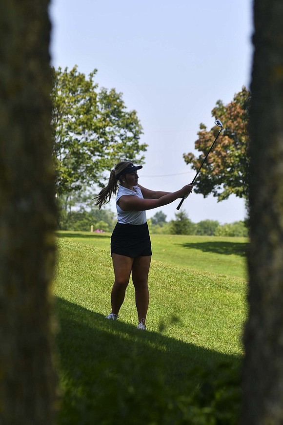 Fort Recovery High School junior Olivia Knapke follows through on a swing on the second hole at Union City Country Club during Tuesday’s Union City Classic. Knapke finished with a 51, which was the fourth-best score of the match, to help the Indians to a second-place finish. (The Commercial Review/Andrew Balko)