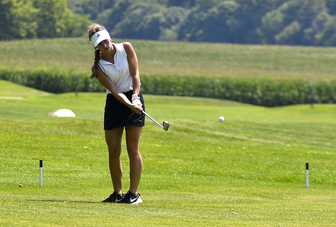 FRHS senior Emma Will chips onto the third green at Union City Country Club on Tuesday. Will provided the best score for the Indians, shooting a 49 to help the Indians take down Tri-Village and earn herself the third-best score of the match. (The Commercial Review/Andrew Balko)