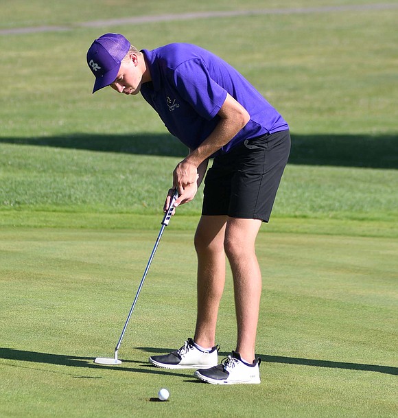 Eli Lennartz, a senior at FRHS, watches his ball lip around the edge of the 12th hole Thursday at Portland Golf Club in a 171-208 victory over Mississinawa Valley. Lennartz earned match medalist honors by shooting a 40. (The Commercial Review/Andrew Balko)