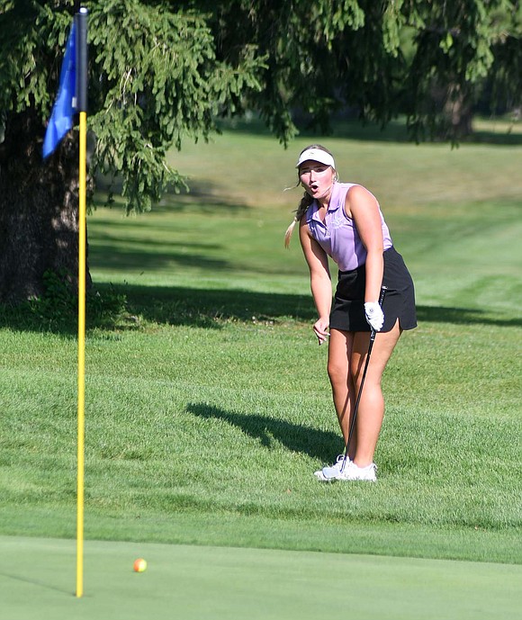 FRHS junior Olivia Knapke reacts to her ball rolling toward the fourth  hole at Wabash Valley Golf Club on Tuesday. Her chip hit the pin and rolled over the hole without going in, setting up a tap in for par. (The Commercial Review/Andrew Balko)