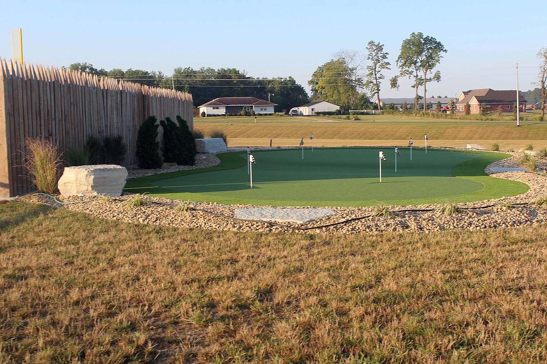 Pictured is the new putting green outside of Fort Recovery Middle School, which was made in honor of Joe Bruns, a 27-year teacher at Fort Recovery High School and girls golf coach, who died of cancer in August 2023. Work on the green finished in early August by Natures Green Nursery of Fort Recovery. (The Commercial Review/Andrew Balko)