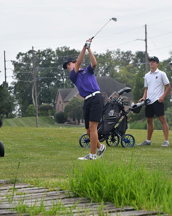 Fort Recovery High School junior Reece LeFevre hits over the creek on the 16th hole at Portland Golf Club on Thursday. LeFevre finished with a team-best 37 strokes to help beat the Parkway Panthers. (The Commercial Review/Andrew Balko)