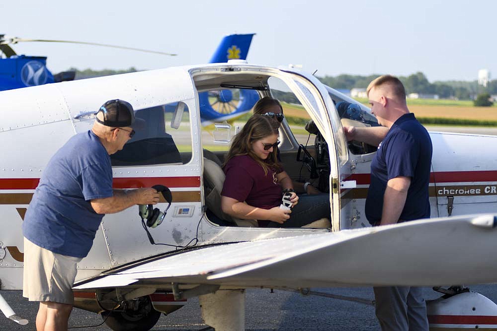 Visitors to Portland Municipal Airport pancake breakfast and fly-in get ready to take a flight Saturday morning. The airport offered flights for $20. An opportunity for children and teens to take free flights comes next month when the airport hosts a Young Eagles event from 9:30 a.m. to 12:30 p.m. Saturday, Sept. 7. Free plane rides will be offered for ages 8 through 17. (The Commercial Review/Ray Cooney)