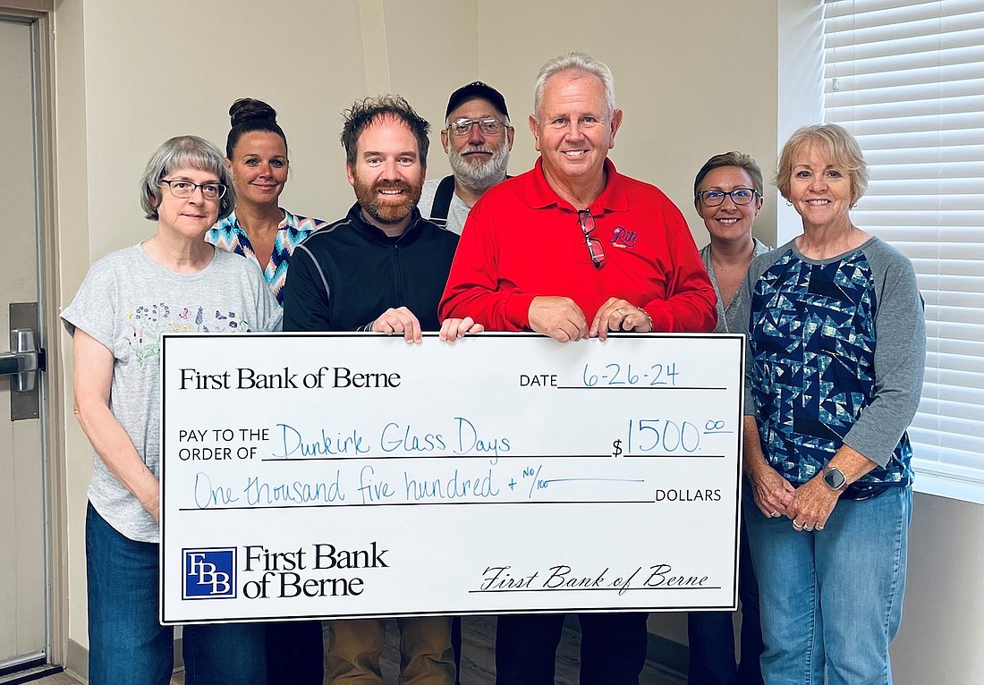 First Bank of Berne recently donated $1,500 to Glass Days. Pictured, front row from left, are Glass Days board members Rose Morgan, Kyle Holt, Dru Hall and Pam Robbins. Back Row are Afton Ridgway, Tom Brosher and Jenn Collins. (Photo provided)