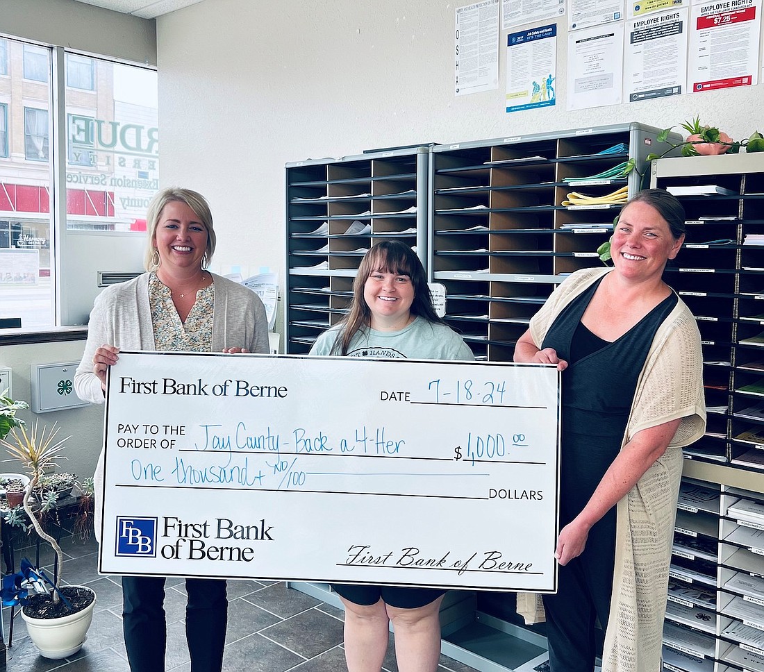 First Bank of Berne recently donated $1,000 to Jay County 4-H’s Back a 4-Her program. It is designed to help 4-H members practice networking and other workforce readiness skills. Pictured, from left, are Tracy Carpenter of First Bank of Berne and Jay County Purdue Extension employees Jessica Kerrigan and Allison Keen. (Photo provided)