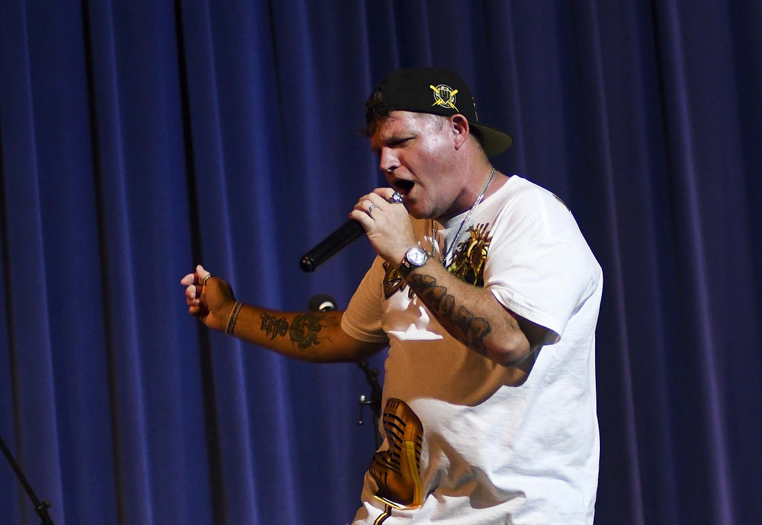 Christian hip hop artist Redeemed performs Saturday during Hopefest at Jay County Junior-Senior High School. The community outreach event featured health screenings, carnival games, archery tag, refreshments and a concert that also featured Mallory Be, Clean Slate and Joe Nester. (The Commercial Review/Ray Cooney)