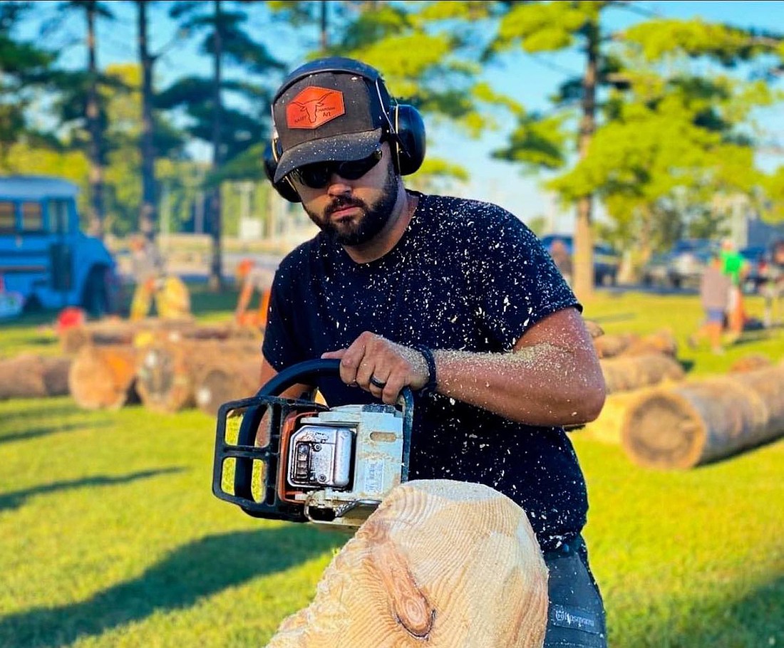 Myles Nasby of rural Ridgeville works on one of his chainsaw art pieces. Nasby, along with several area partners, is hosting the Jay County Chainsaw Carving Invitational and Vendor Fair this weekend at Jay County Fairgrounds. It will run from noon to 6 p.m. Friday, 10 a.m. to 6 p.m. Saturday and 10 a.m. to 3 p.m. Sunday, with an auction at 3 p.m. Sunday. (Photo provided)