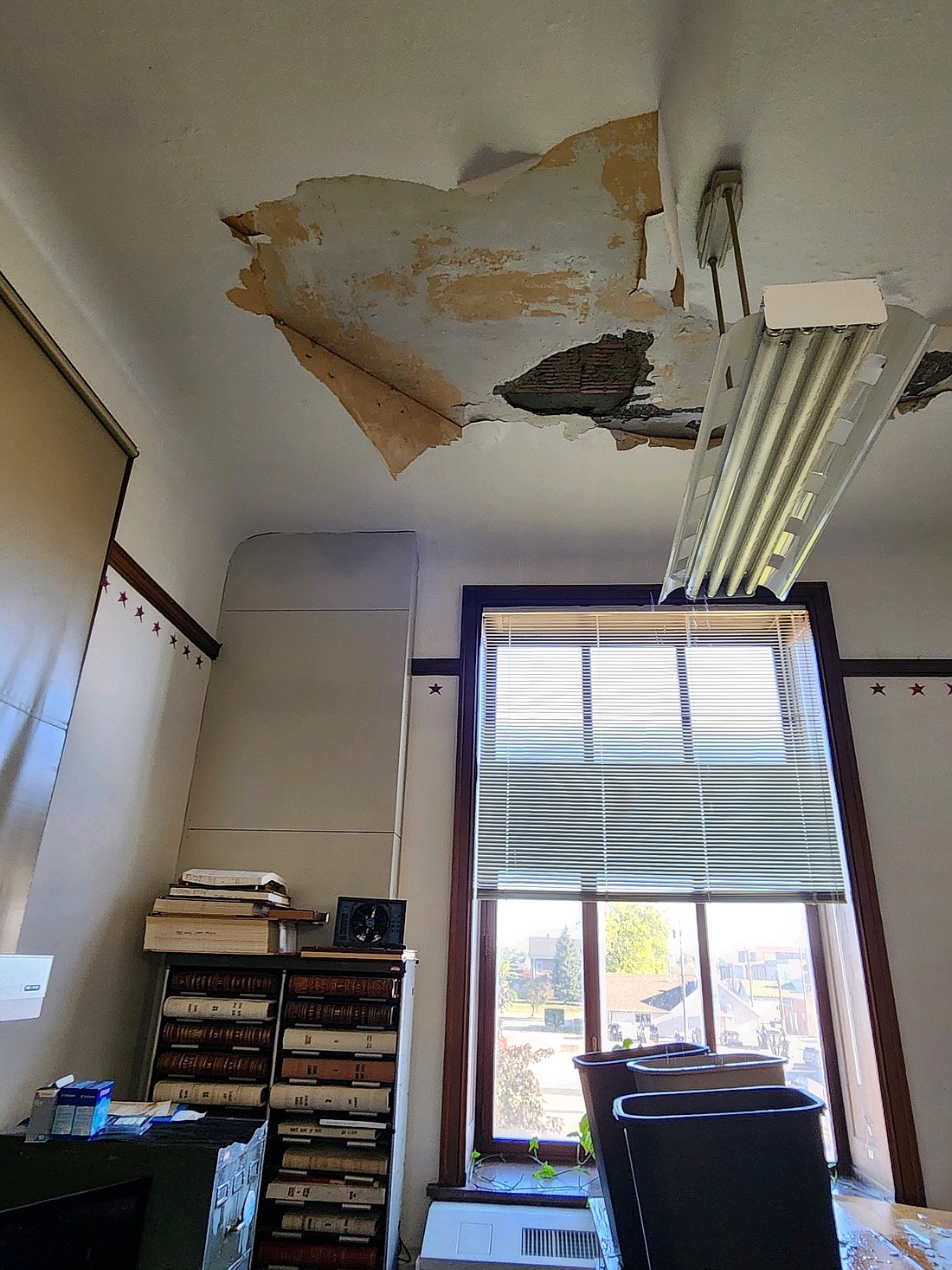 A water leak last week caused damage, including ceiling damage pictured above, to the recorder’s office and prosecutor’s office at Jay County Courthouse. The recorder’s office staff has temporarily relocated to the commissioners’ room on the second floor of the courthouse. (Photo provided)