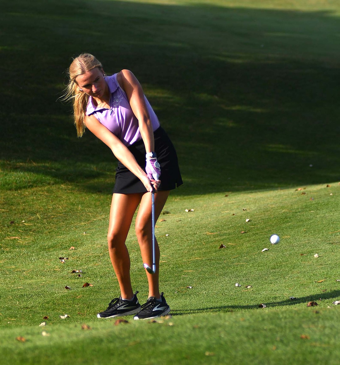 Fort Recovery High School’s Evvie Briner chips onto the 15th hole at Mercer County Elks Golf Club on Thursday. FRHS took down St. Henry 205-212 to finish MAC play with a perfect 8-0 record for the first time in program history. (The Commercial Review/Andrew Balko)